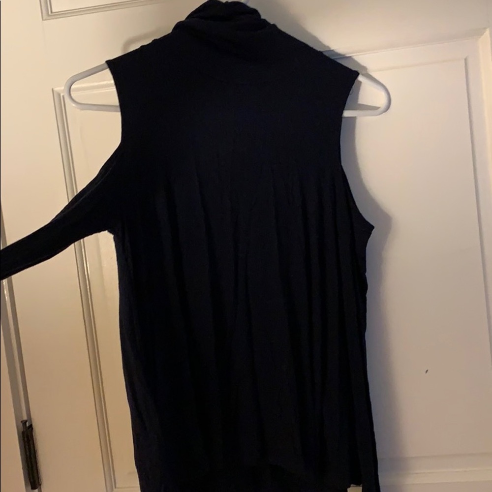 Turtle neck sweater with open shoulders